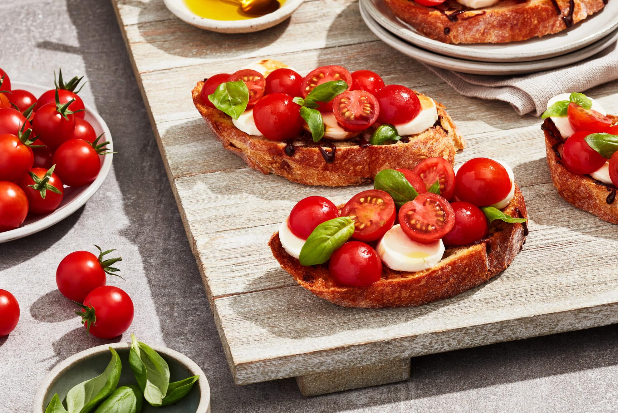 One Sweet® Tomato Caprese Bruschetta - SUNSET Grown. All rights reserved.