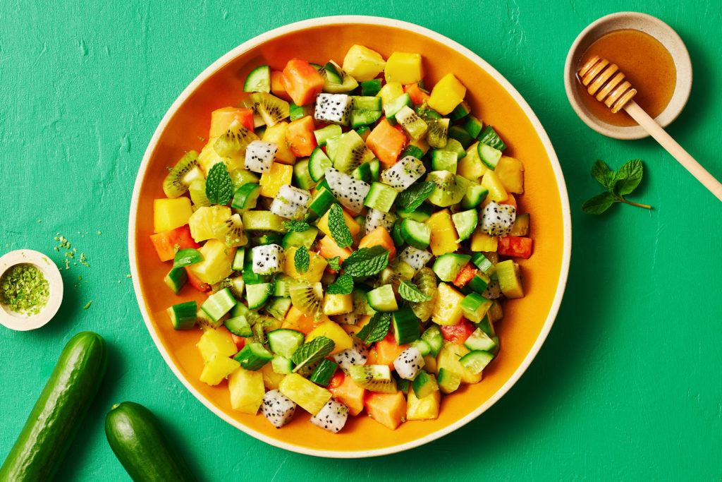 Tropical Fruit Salad with SUNSET® Mini Cucumbers - SUNSET Grown. All rights reserved.